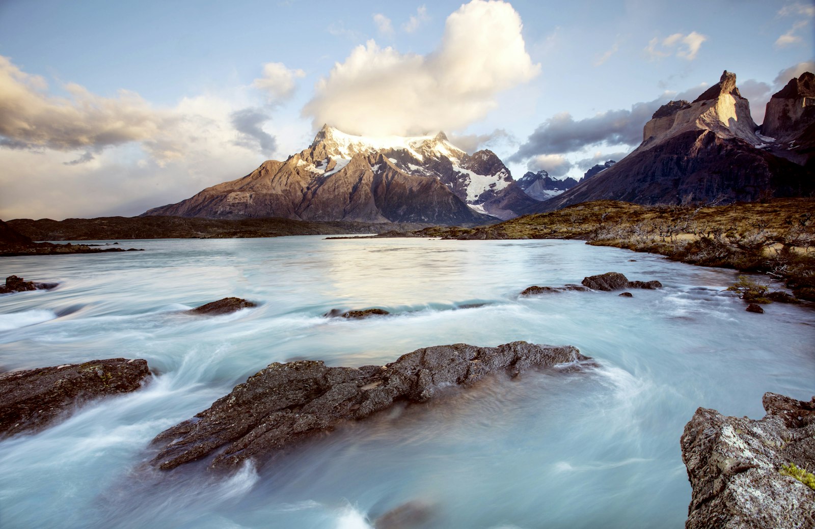 A cool Patagonian lake among mountains near the wine valleys